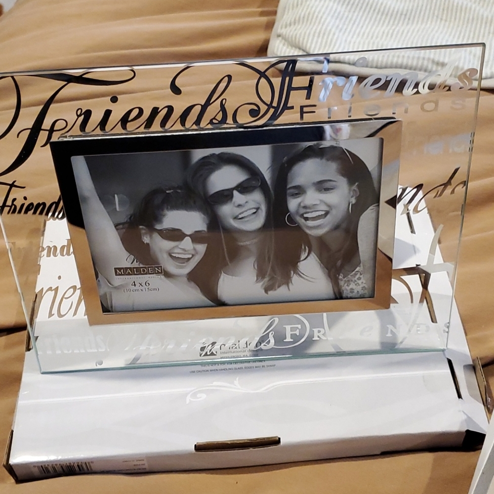 Glass frame NWT with the word "friends" all over